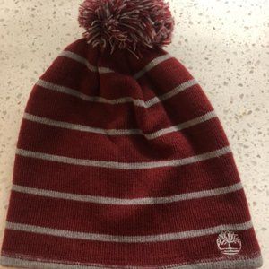red timberland beanie with pom pom